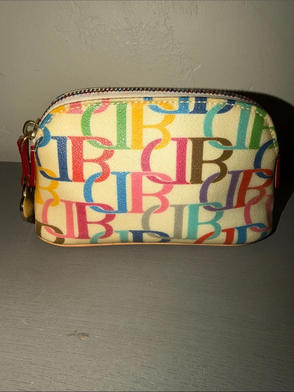 Dooney & Bourke Multicolor Logo Cosmetic Pouch - Cream Base
